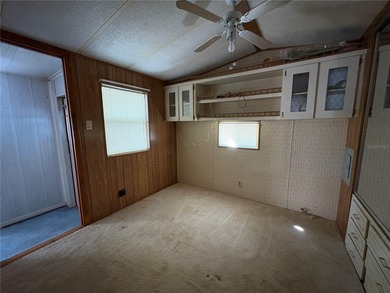 PRICED TO SELL!  Close to everything but far enough away for on Deer Creek RV Golf Resort in Florida - for sale on GolfHomes.com, golf home, golf lot