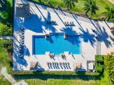 Tamarac's premier newly built community. 5 beds/3.5 baths + on Woodmont Country Club in Florida - for sale on GolfHomes.com, golf home, golf lot