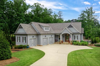 This beautiful home nestled along the lakefront in the Angel on Reynolds Lake Oconee - The Creek Club in Georgia - for sale on GolfHomes.com, golf home, golf lot