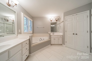 This beautifully remodeled home is nestled on nearly 1.5 acres on Green Oaks Golf Course in North Carolina - for sale on GolfHomes.com, golf home, golf lot