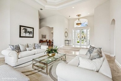 CUSTOM ESTATE HOME WITH 4BR PLUS OFFICE/4.1 BATHS LOCATED ON A on  in Florida - for sale on GolfHomes.com, golf home, golf lot