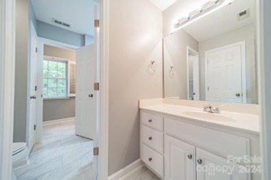 This beautifully remodeled home is nestled on nearly 1.5 acres on Green Oaks Golf Course in North Carolina - for sale on GolfHomes.com, golf home, golf lot