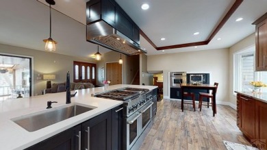 An extraordinary 5-bedroom, 6-bathroom unique tri-level home on Desert Hawk At Pueblo West in Colorado - for sale on GolfHomes.com, golf home, golf lot