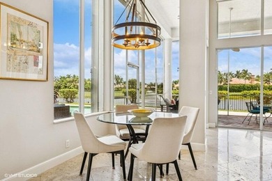 CUSTOM ESTATE HOME WITH 4BR PLUS OFFICE/4.1 BATHS LOCATED ON A on  in Florida - for sale on GolfHomes.com, golf home, golf lot