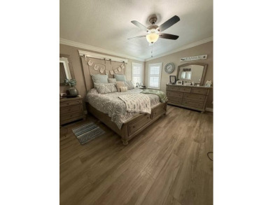 One of a kind!  This triple-wide, three-bedroom retreat has been on Hamptons Golf Club in Florida - for sale on GolfHomes.com, golf home, golf lot