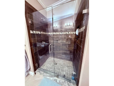 One of a kind!  This triple-wide, three-bedroom retreat has been on Hamptons Golf Club in Florida - for sale on GolfHomes.com, golf home, golf lot