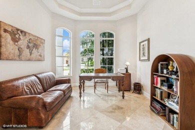 CUSTOM ESTATE HOME WITH 4BR PLUS OFFICE/4.1 BATHS LOCATED ON A on  in Florida - for sale on GolfHomes.com, golf home, golf lot