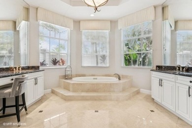 CUSTOM ESTATE HOME WITH 4BR PLUS OFFICE/4.1 BATHS LOCATED ON A on  in Florida - for sale on GolfHomes.com, golf home, golf lot