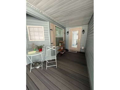 One of a kind!  This triple-wide, three-bedroom retreat has been on Hamptons Golf Club in Florida - for sale on GolfHomes.com, golf home, golf lot