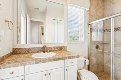 CUSTOM ESTATE HOME WITH 4BR PLUS OFFICE/4.1 BATHS LOCATED ON A on  in Florida - for sale on GolfHomes.com, golf home, golf lot