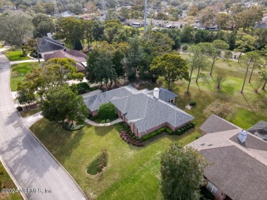 Discover this all-brick ranch-style home in the desirable on Hidden Hills Country Club in Florida - for sale on GolfHomes.com, golf home, golf lot