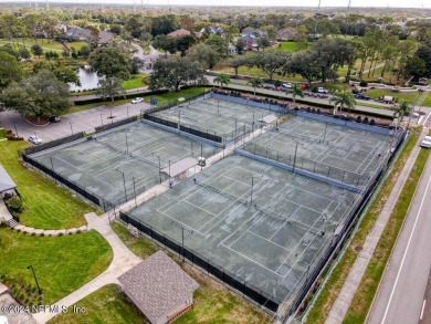 Discover this all-brick ranch-style home in the desirable on Hidden Hills Country Club in Florida - for sale on GolfHomes.com, golf home, golf lot