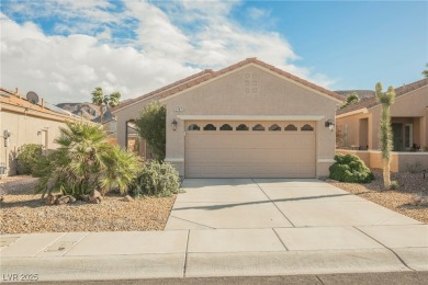 Step into the vibrant lifestyle of Sun City MacDonald Ranch, one on Desert Willow Golf Course in Nevada - for sale on GolfHomes.com, golf home, golf lot