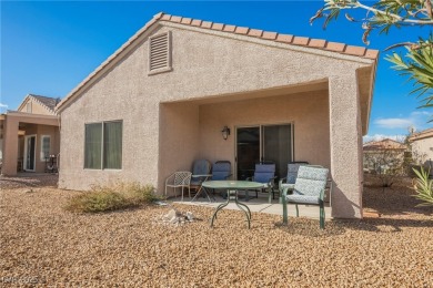 Step into the vibrant lifestyle of Sun City MacDonald Ranch, one on Desert Willow Golf Course in Nevada - for sale on GolfHomes.com, golf home, golf lot