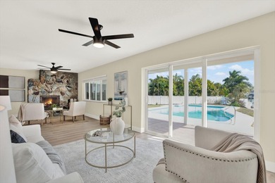 FABULOUS WATERFRONT POOL HOME IN HIGHLY DESIRABLE OAKHURST on The Tides Golf Club in Florida - for sale on GolfHomes.com, golf home, golf lot