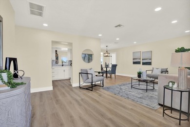 FABULOUS WATERFRONT POOL HOME IN HIGHLY DESIRABLE OAKHURST on The Tides Golf Club in Florida - for sale on GolfHomes.com, golf home, golf lot