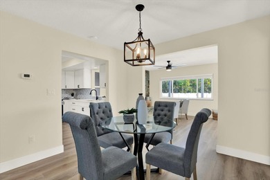 FABULOUS WATERFRONT POOL HOME IN HIGHLY DESIRABLE OAKHURST on The Tides Golf Club in Florida - for sale on GolfHomes.com, golf home, golf lot