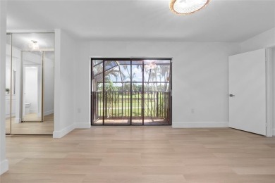 GORGEOUS 3/2.5 ON THE 12TH HOLE with Stunning Sunsets. Updated on Pine Island Ridge Country Club in Florida - for sale on GolfHomes.com, golf home, golf lot
