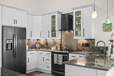 Welcome to 1432 Winged Foot Ct in Murrells Inlet, a beautifully on Indigo Creek Golf Club in South Carolina - for sale on GolfHomes.com, golf home, golf lot