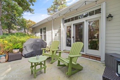 This beautiful home is nestled on a completely landscaped wooded on Lockwood Folly Country Club in North Carolina - for sale on GolfHomes.com, golf home, golf lot