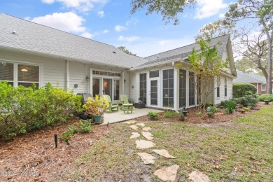 This beautiful home is nestled on a completely landscaped wooded on Lockwood Folly Country Club in North Carolina - for sale on GolfHomes.com, golf home, golf lot