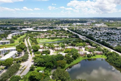 GORGEOUS 3/2.5 ON THE 12TH HOLE with Stunning Sunsets. Updated on Pine Island Ridge Country Club in Florida - for sale on GolfHomes.com, golf home, golf lot