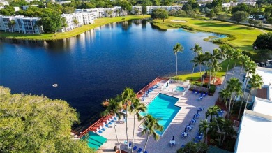 GORGEOUS 3/2.5 ON THE 12TH HOLE with Stunning Sunsets. Updated on Pine Island Ridge Country Club in Florida - for sale on GolfHomes.com, golf home, golf lot