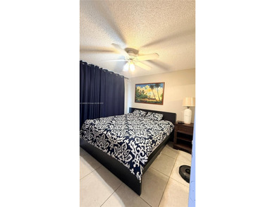 Be the owner of this beautifully updated 2-bedroom, 2-bathroom on Flamingo Lakes Country Club in Florida - for sale on GolfHomes.com, golf home, golf lot