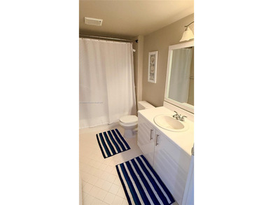 Be the owner of this beautifully updated 2-bedroom, 2-bathroom on Flamingo Lakes Country Club in Florida - for sale on GolfHomes.com, golf home, golf lot