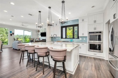 Embrace the timeless elegance of coastal Southern living in this on The King and Prince Golf Course, Home of the Hampton Club in Georgia - for sale on GolfHomes.com, golf home, golf lot