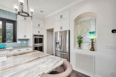 Embrace the timeless elegance of coastal Southern living in this on The King and Prince Golf Course, Home of the Hampton Club in Georgia - for sale on GolfHomes.com, golf home, golf lot