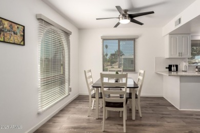 Start creating lasting memories in this charming end-unit on Painted Mountain Golf Club in Arizona - for sale on GolfHomes.com, golf home, golf lot