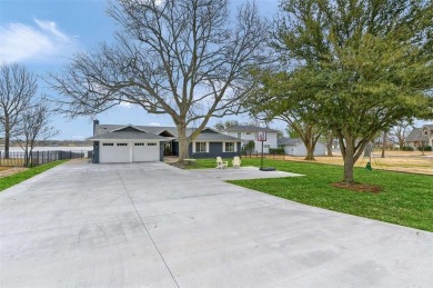 This stunningly reimagined lakeside retreat is a perfect fusion on Lake Kiowa Golf Course in Texas - for sale on GolfHomes.com, golf home, golf lot