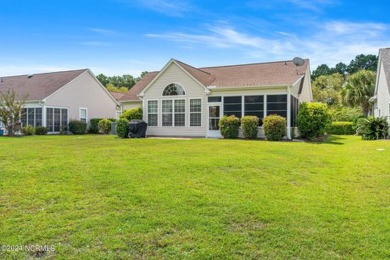 Come and see this spacious 3-bedroom home with private back yard on Sandpiper Bay Golf and Country Club in North Carolina - for sale on GolfHomes.com, golf home, golf lot