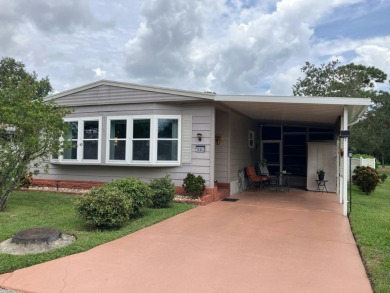 Beautiful and serene 2BR/2BA home with stunning golf course on Fairways Country Club in Florida - for sale on GolfHomes.com, golf home, golf lot