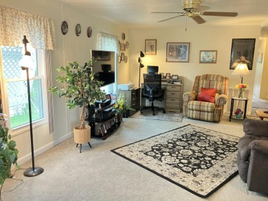 Beautiful and serene 2BR/2BA home with stunning golf course on Fairways Country Club in Florida - for sale on GolfHomes.com, golf home, golf lot