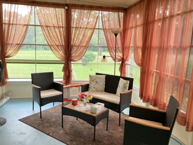 Beautiful and serene 2BR/2BA home with stunning golf course on Fairways Country Club in Florida - for sale on GolfHomes.com, golf home, golf lot