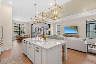 Live the unparalleled lakefront lifestyle you've always dreamed on Naples National Golf Club in Florida - for sale on GolfHomes.com, golf home, golf lot