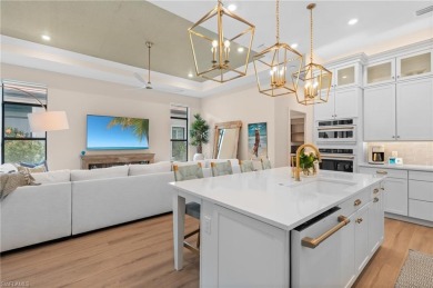 Live the unparalleled lakefront lifestyle you've always dreamed on Naples National Golf Club in Florida - for sale on GolfHomes.com, golf home, golf lot