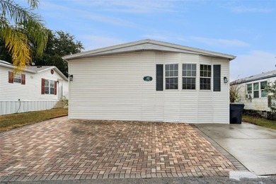 Welcome home to this beautifully maintained 3-bedroom, 2-bath on Polo Park East in Florida - for sale on GolfHomes.com, golf home, golf lot