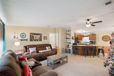 Welcome home to this beautifully maintained 3-bedroom, 2-bath on Polo Park East in Florida - for sale on GolfHomes.com, golf home, golf lot