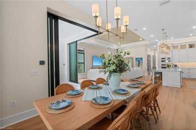 Live the unparalleled lakefront lifestyle you've always dreamed on Naples National Golf Club in Florida - for sale on GolfHomes.com, golf home, golf lot