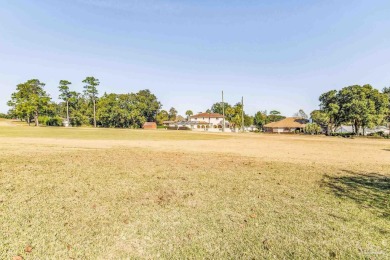 Situated on the 18th fairway of the beautiful Scenic Hills on Scenic Hills Country Club in Florida - for sale on GolfHomes.com, golf home, golf lot