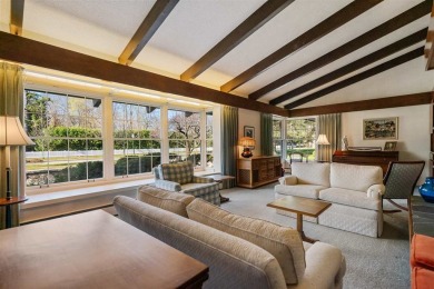 Mid-century modern classic, designed by renowned Charlevoix on Charlevoix Golf Club in Michigan - for sale on GolfHomes.com, golf home, golf lot