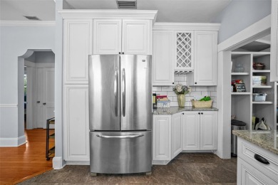 Step into this beautifully maintained historic bungalow located on Palma Ceia Golf and Country Club in Florida - for sale on GolfHomes.com, golf home, golf lot