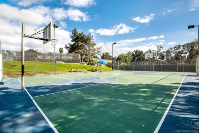 Enjoy resort-style living in this beautiful upper-level corner on Rancho Bernardo Inn Golf Course in California - for sale on GolfHomes.com, golf home, golf lot