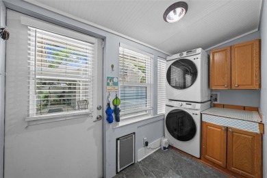 Step into this beautifully maintained historic bungalow located on Palma Ceia Golf and Country Club in Florida - for sale on GolfHomes.com, golf home, golf lot