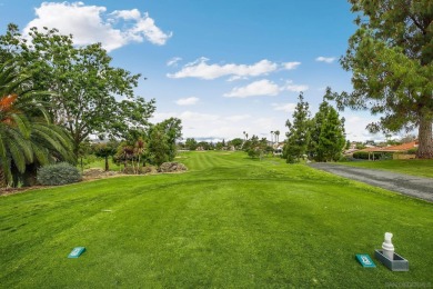 Enjoy resort-style living in this beautiful upper-level corner on Rancho Bernardo Inn Golf Course in California - for sale on GolfHomes.com, golf home, golf lot