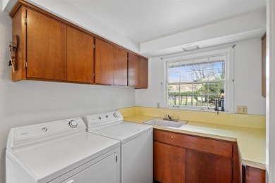 Mid-century modern classic, designed by renowned Charlevoix on Charlevoix Golf Club in Michigan - for sale on GolfHomes.com, golf home, golf lot