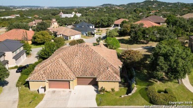 This charming two bedroom/two bath Mediterranean-style garden on The Dominion Country Club in Texas - for sale on GolfHomes.com, golf home, golf lot